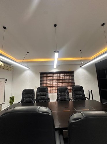 Ree-Hub boardroom with a meeting table and executive chairs